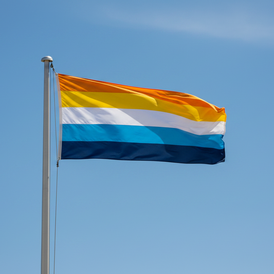 aroace pride flag attached to a flagpole and waving in the wind with a blue sky in the background. The flag has 5 stripes, orange, yellow, white, light blue, and dark blue