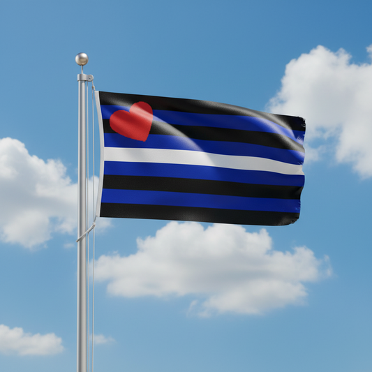 A leather pride flag with alternating black and blue horizontal bands, a white stripe, and a red heart in the upper left, flying on a silver flagpole against a blue sky with clouds.