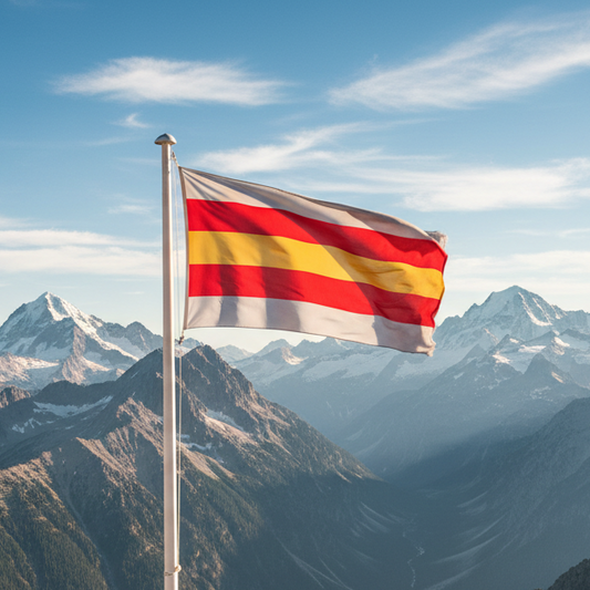 proculsexual pride flag with 5 stripes, grey, red, yellow, red, and grey. This flag is flying from a flagpole with mountains in the background.