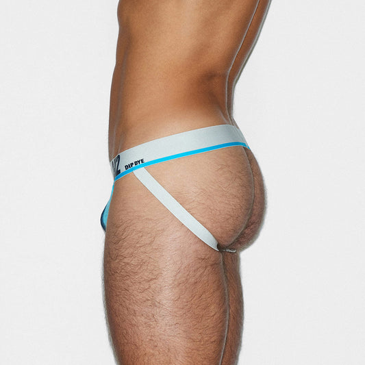 Partial view of a person wearing a white and blue jockstrap with white waistband on a light gray background