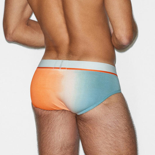 Colorful men's underwear on a plain background