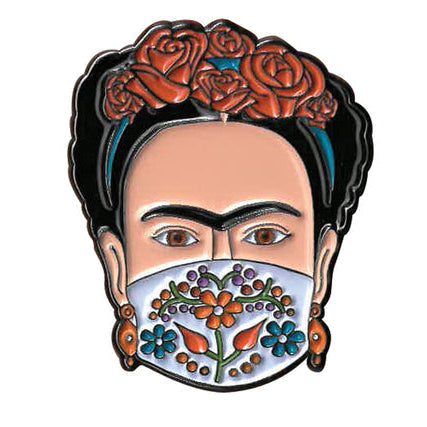 Frida Kahlo-style lapel pin with floral design on a white background