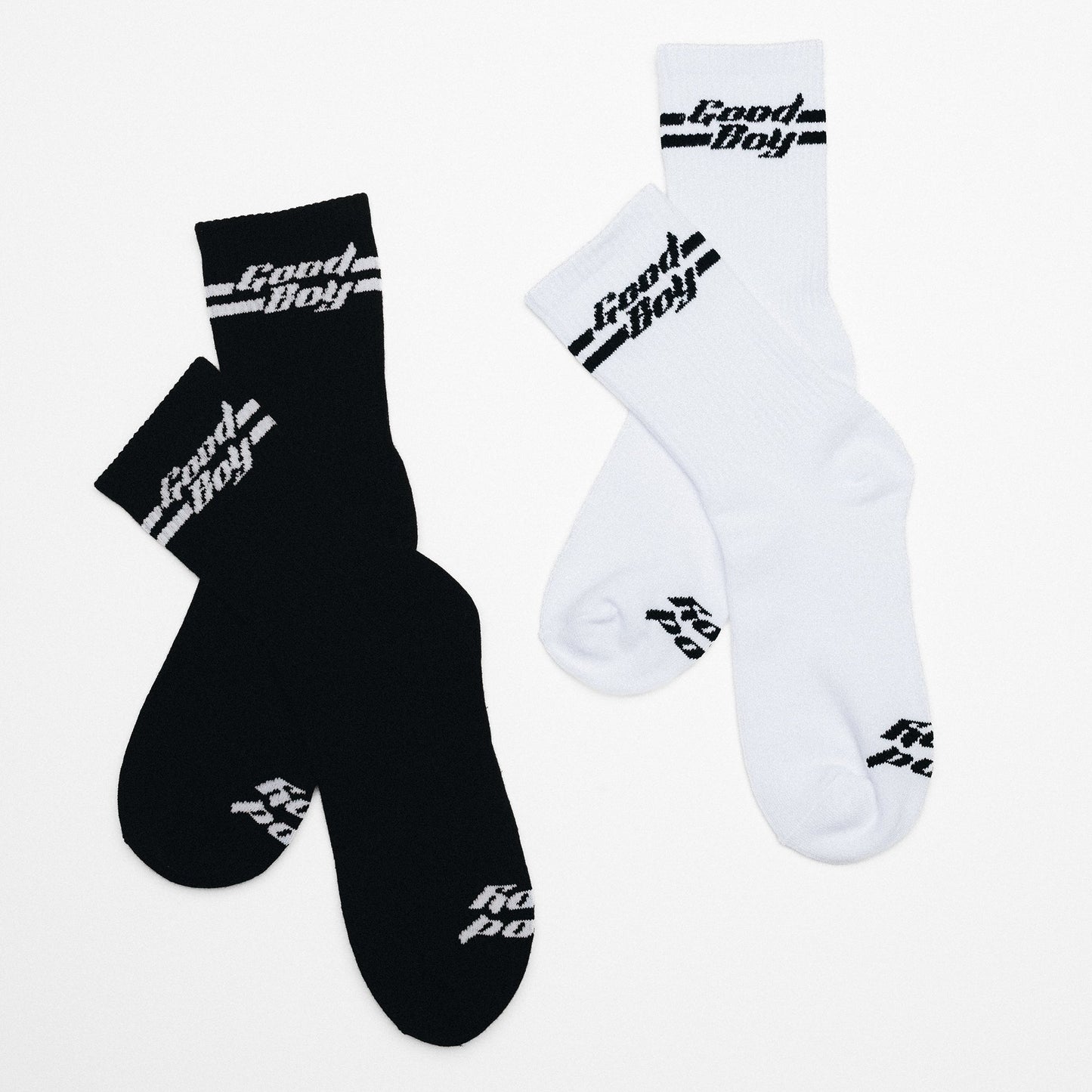 Black and white socks with 'Good Boy' text on a white background