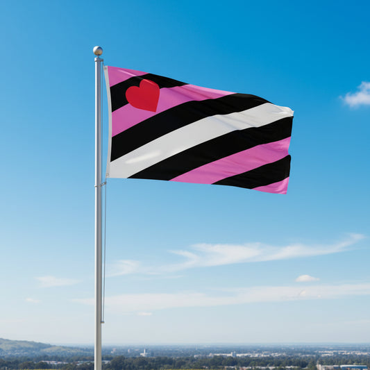 flag representing leather girl pride in pink, black, and white vertical stripes with a red heart in upper corner being flown from flagpole with blue sky in background