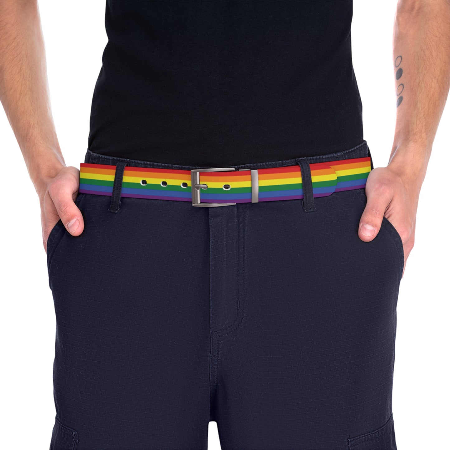 Person wearing a black shirt and navy pants with a rainbow lgbtq pride belt on a white background