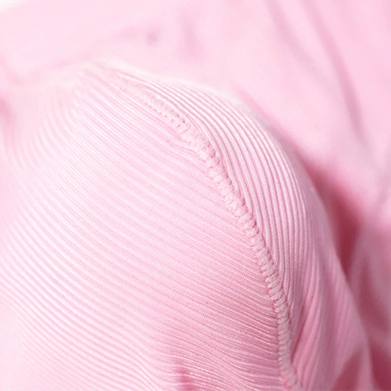Close-up of pink fabric with a textured pattern