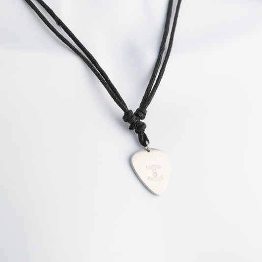 Necklace with a guitar pick pendant on a white background