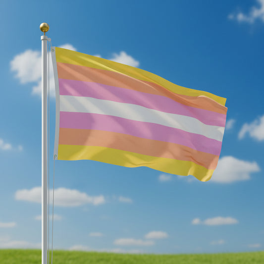 pangender pride flag with horizontal stripes in pastel colors of yellow, orange, pink, and white flown from a flagpole against a blue sky