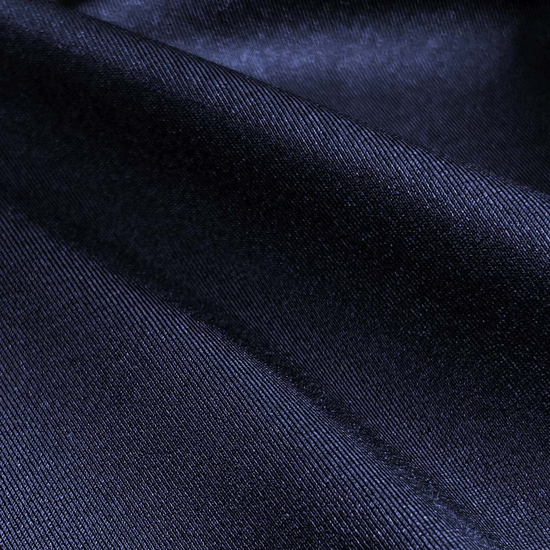 Close-up of dark blue fabric with visible texture