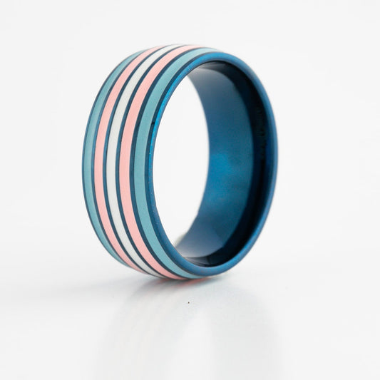 Blue steel ring with trans pride stripes on a white background