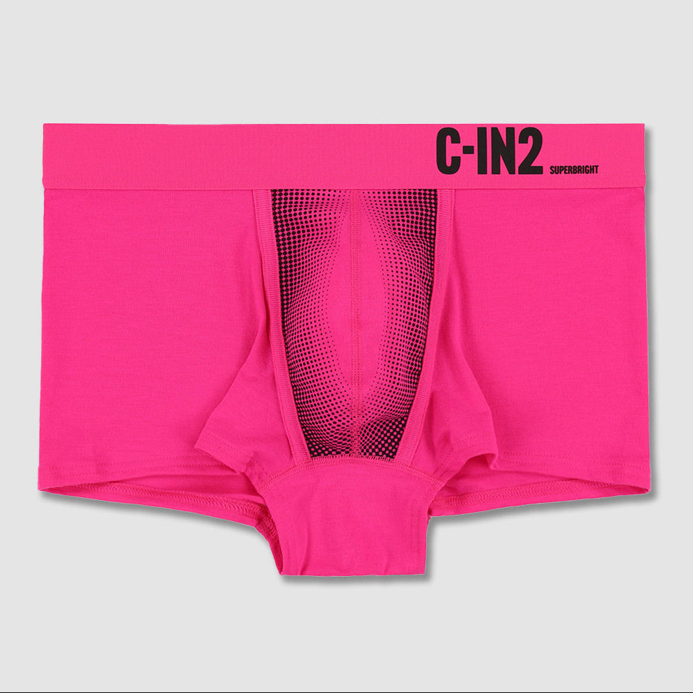 Bright pink men's briefs by C-IN2, featuring a wide waistband with the brand name printed in black and a central mesh panel detail, shown flat on a light gray background.