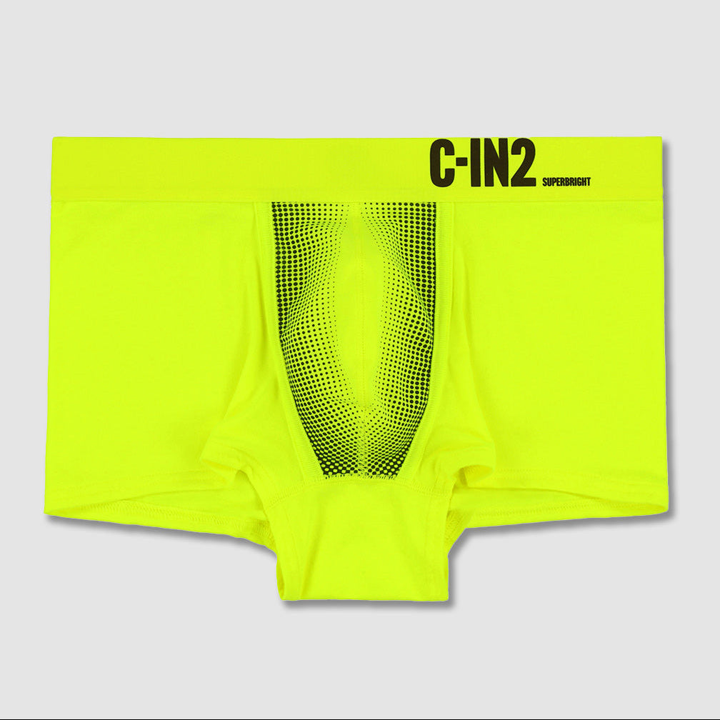 Neon green boxer briefs with mesh back on a light gray background