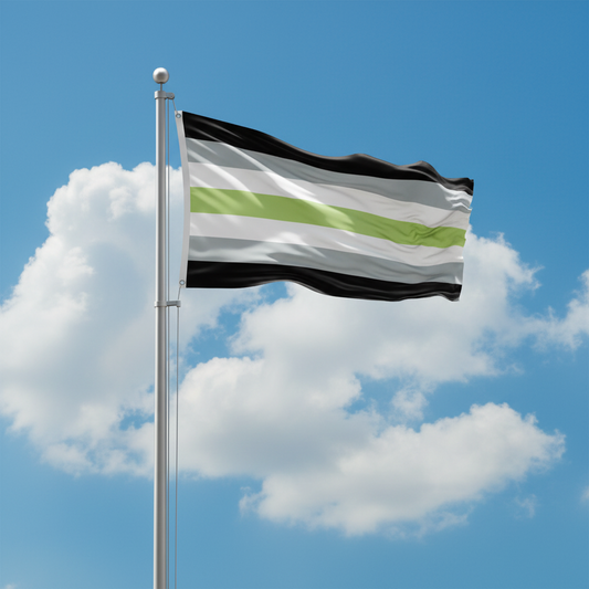 A black, white, gray, and lime green striped flag waving on a silver flagpole against a bright blue sky with white clouds.