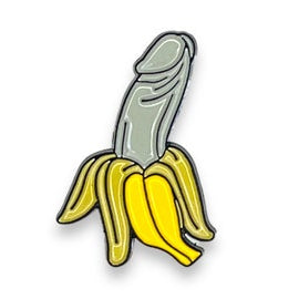 Cheeky banana-shaped lapel pin on a white background