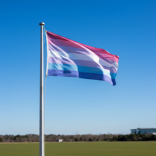 A bigender pride flag with seven horizontal stripes in dark pink, light pink, white, light blue, dark blue, and purple, flying on a silver flagpole outdoors against a clear blue sky.