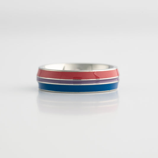 Bisexual pride ring with red, blue, and purple stripes on a white background
