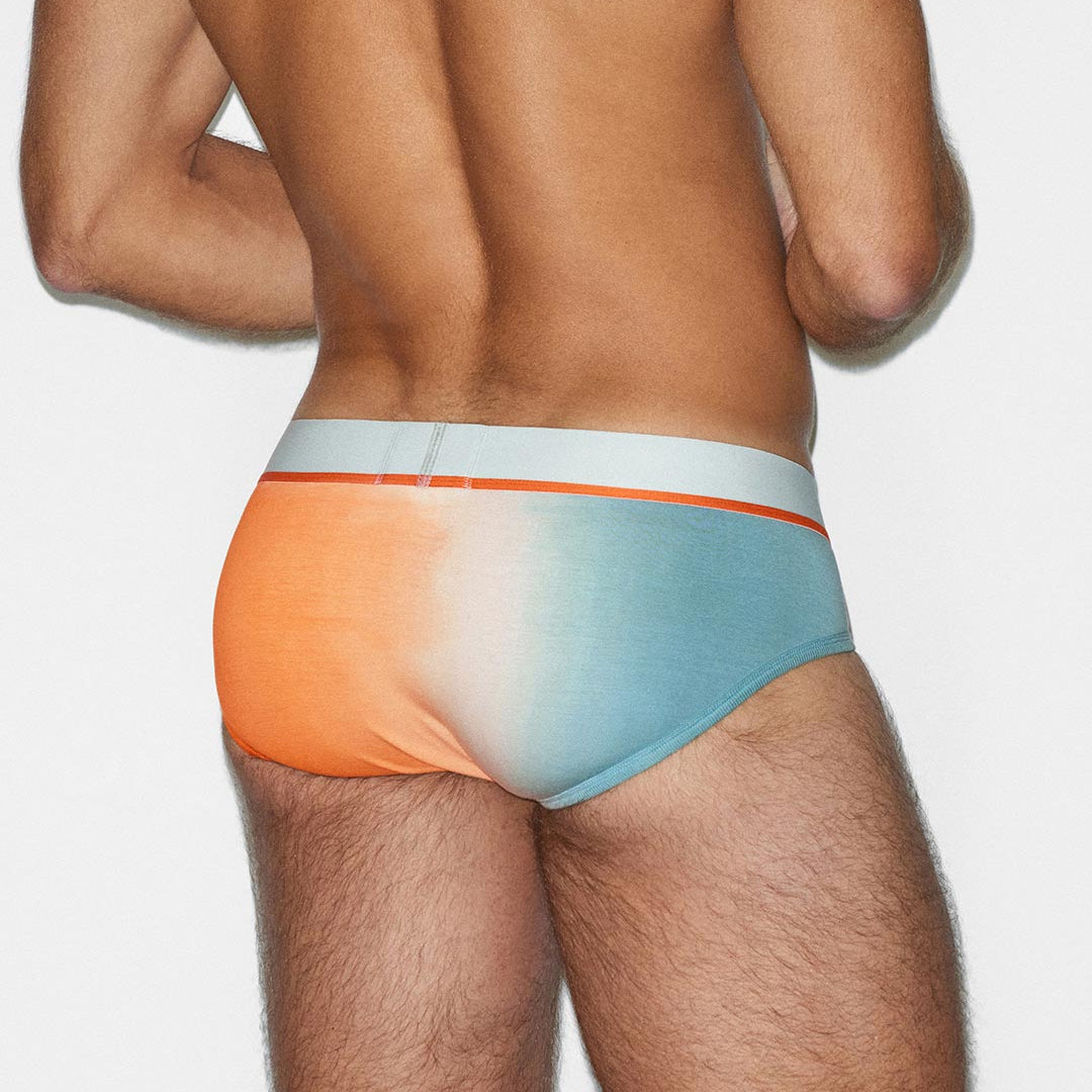Colorful men's underwear on a plain background
