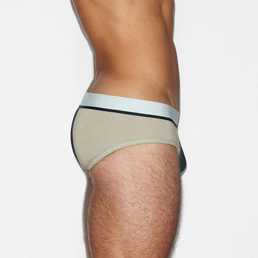 Beige underwear with a white background