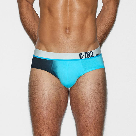 Man wearing a blue and black underwear with 'C-IN2' branding on a white background