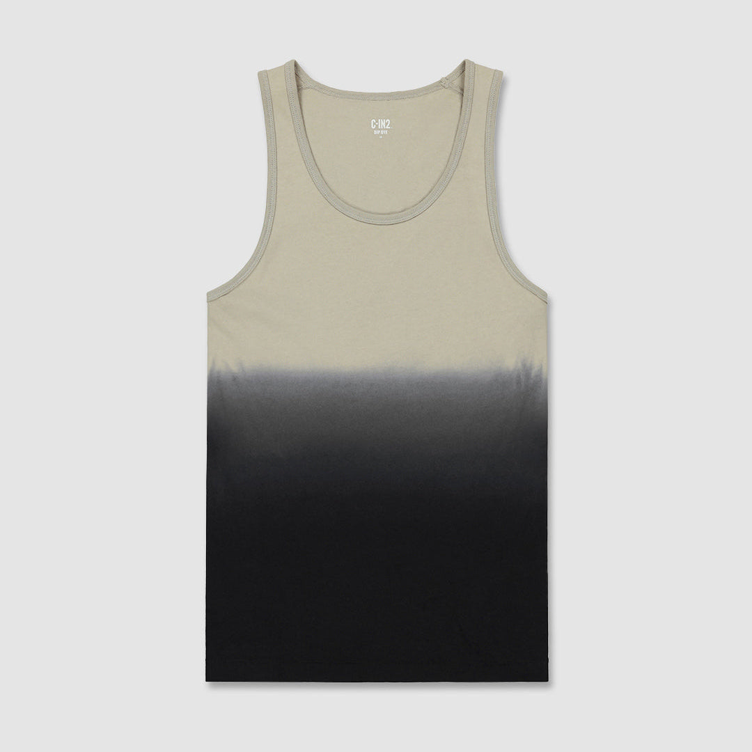 A sleeveless tank top with C-IN2 branding and with a vertical ombre gradient transitioning from light beige at the top to black at the bottom, shown flat against a light gray background.