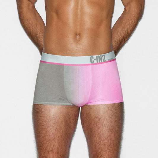 Person wearing a pink and gray underwear with 'C-IN2' brand logo on a white background