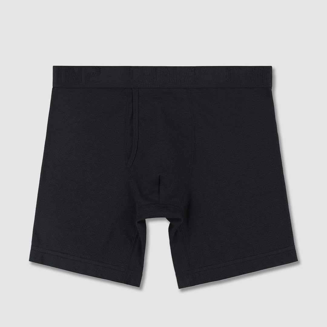 Black boxer briefs on a light gray background