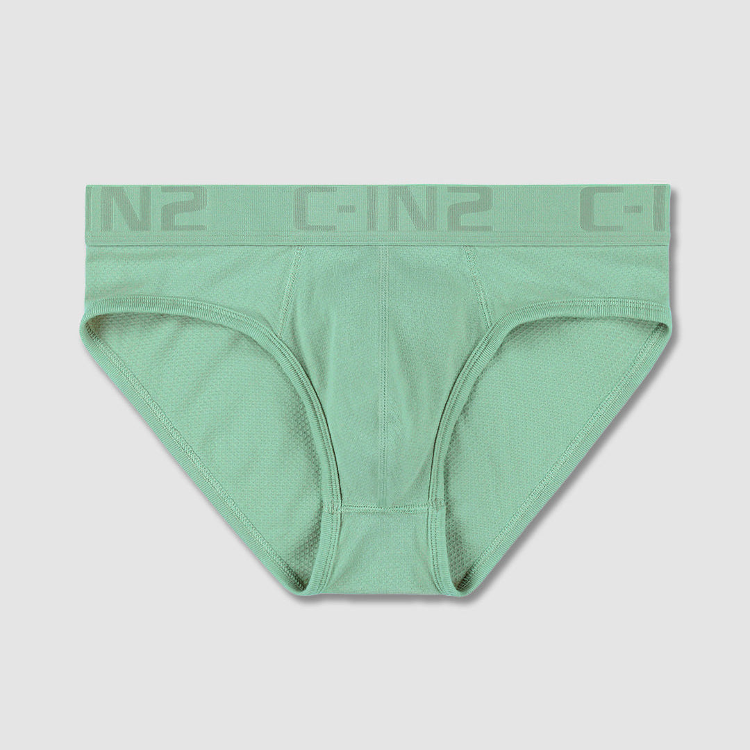 Green men's underwear with a C-IN2 brand logo on a light gray background