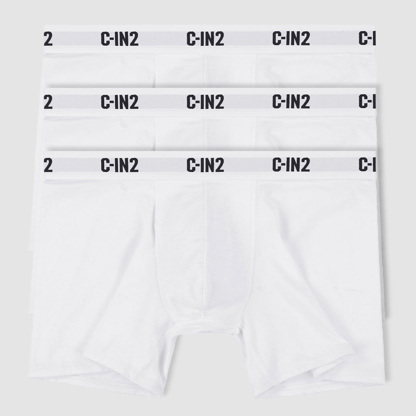 Three pairs of white boxer briefs stacked vertically, each with a light gray elastic waistband printed with the brand name 'C-IN2' in black.