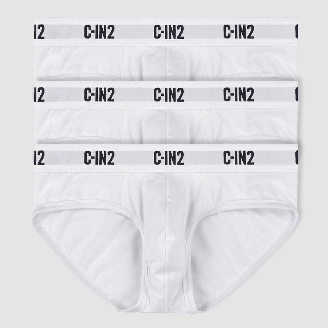 Three pairs of white men's briefs stacked vertically, each with a light gray elastic waistband featuring the black 'C-IN2' logo repeated across the bands, on a light gray background.