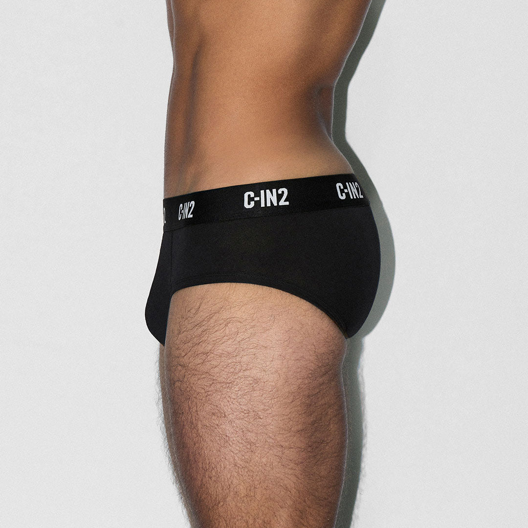 Black underwear with 'C-IN2' brand logo on a white background