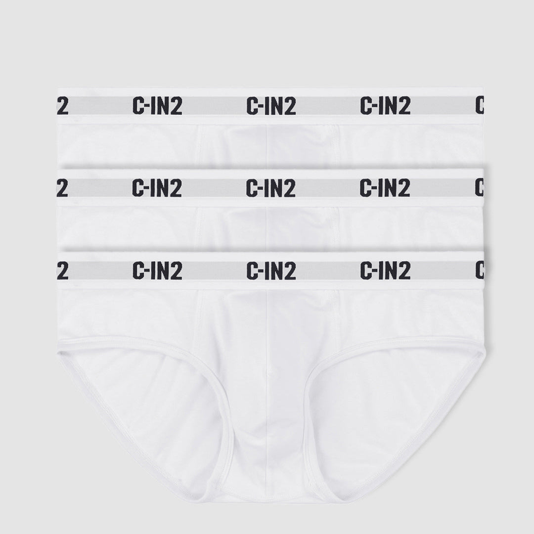 Three pairs of white briefs stacked vertically, each with a light gray elastic waistband featuring the black text 'C-IN2' repeated.