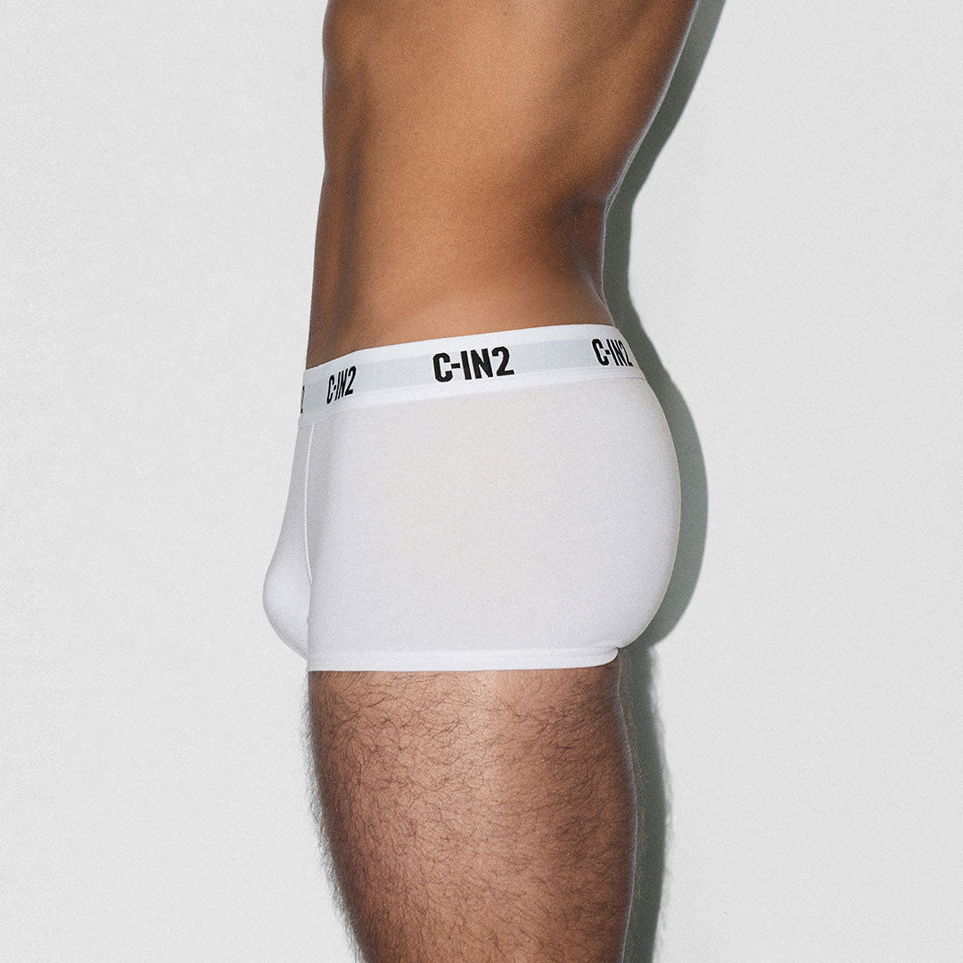 White underwear with 'C-IN2' brand logo on a plain background