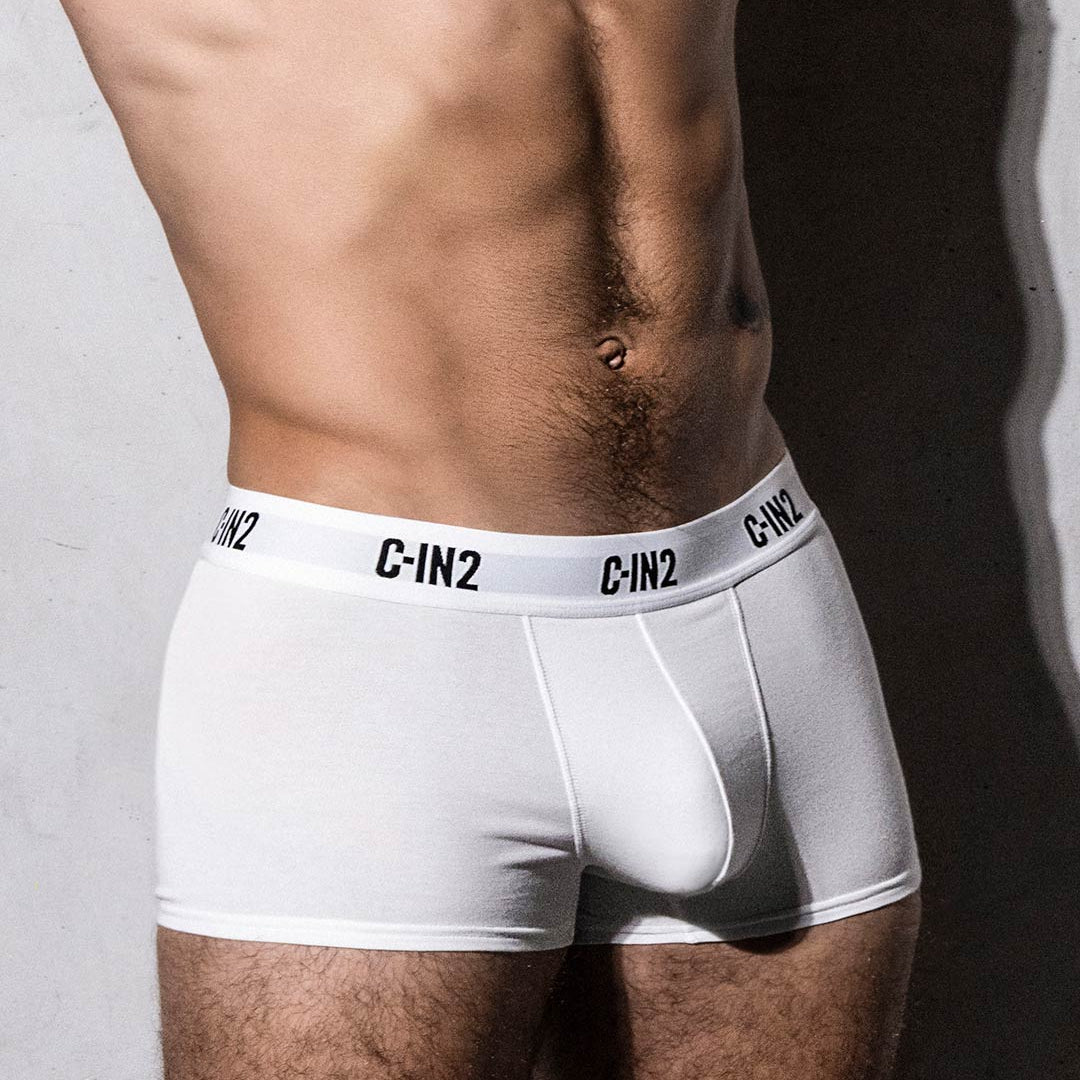 White boxer briefs with 'C-IN2' waistband on a plain background