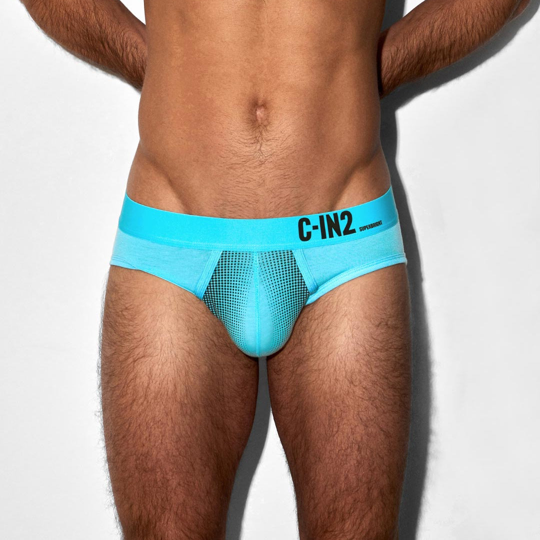 Man wearing a blue C-IN2 underwear on a white background