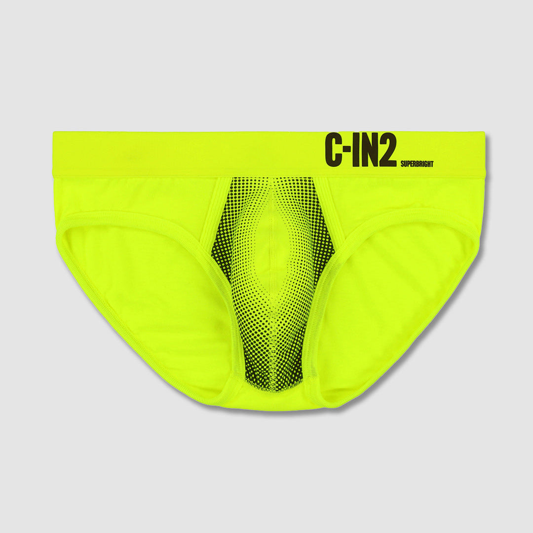 Bright neon yellow-green men's briefs with a black mesh center panel and 'C-IN2' printed in black on the front waistband, shown against a light gray background.
