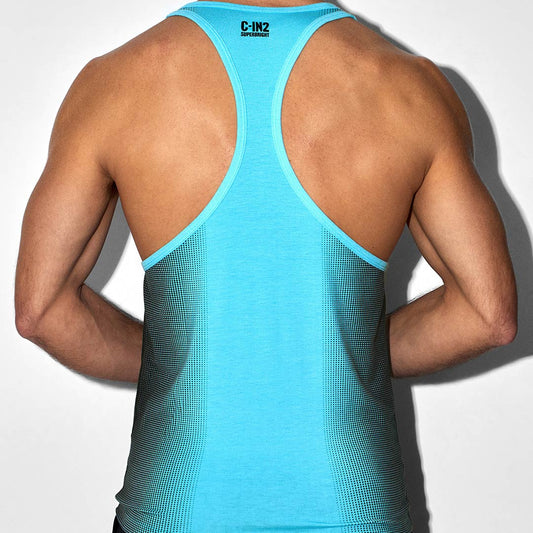 Person wearing a blue tank top with visible branding on a white background