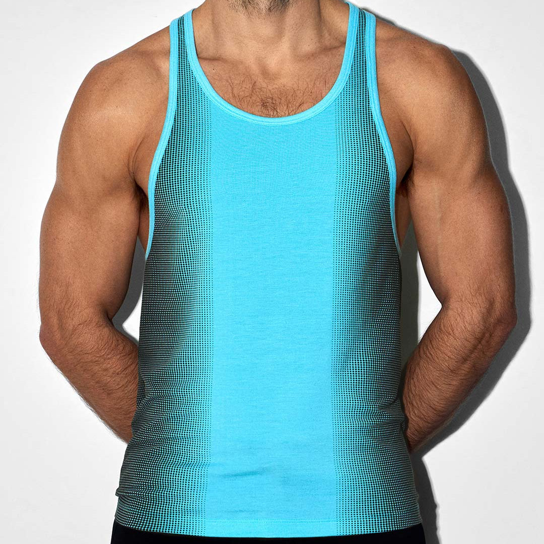 Person wearing a turquoise tank top against a white background