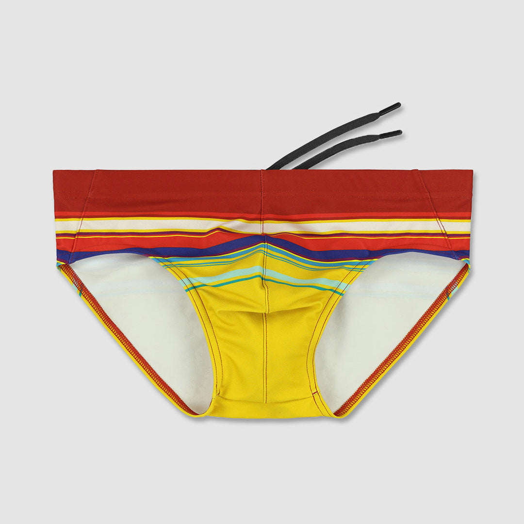 Colorful men's bikini bottom with a white background