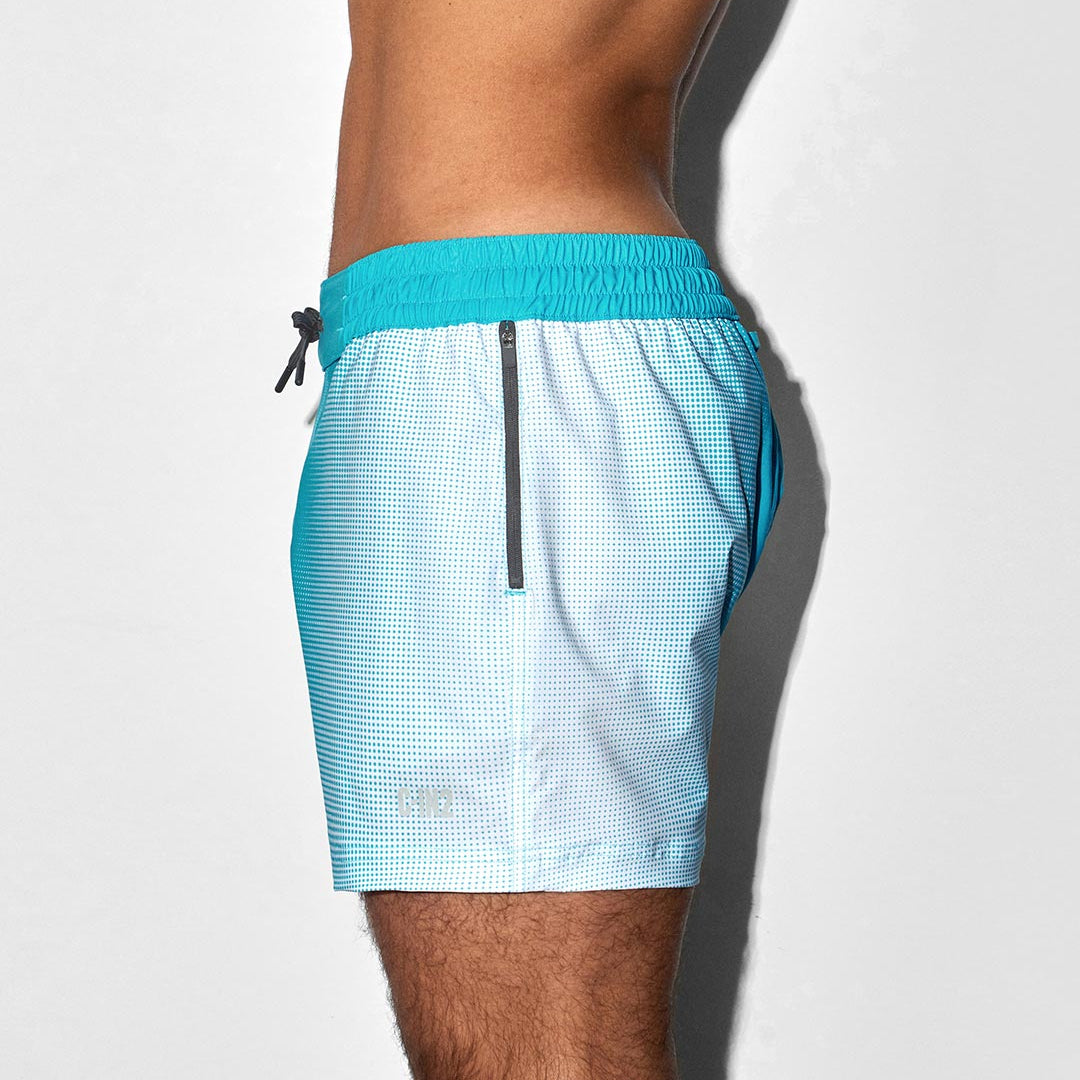 Light blue athletic swim shorts with C-IN2 logo and a zipper on a white background
