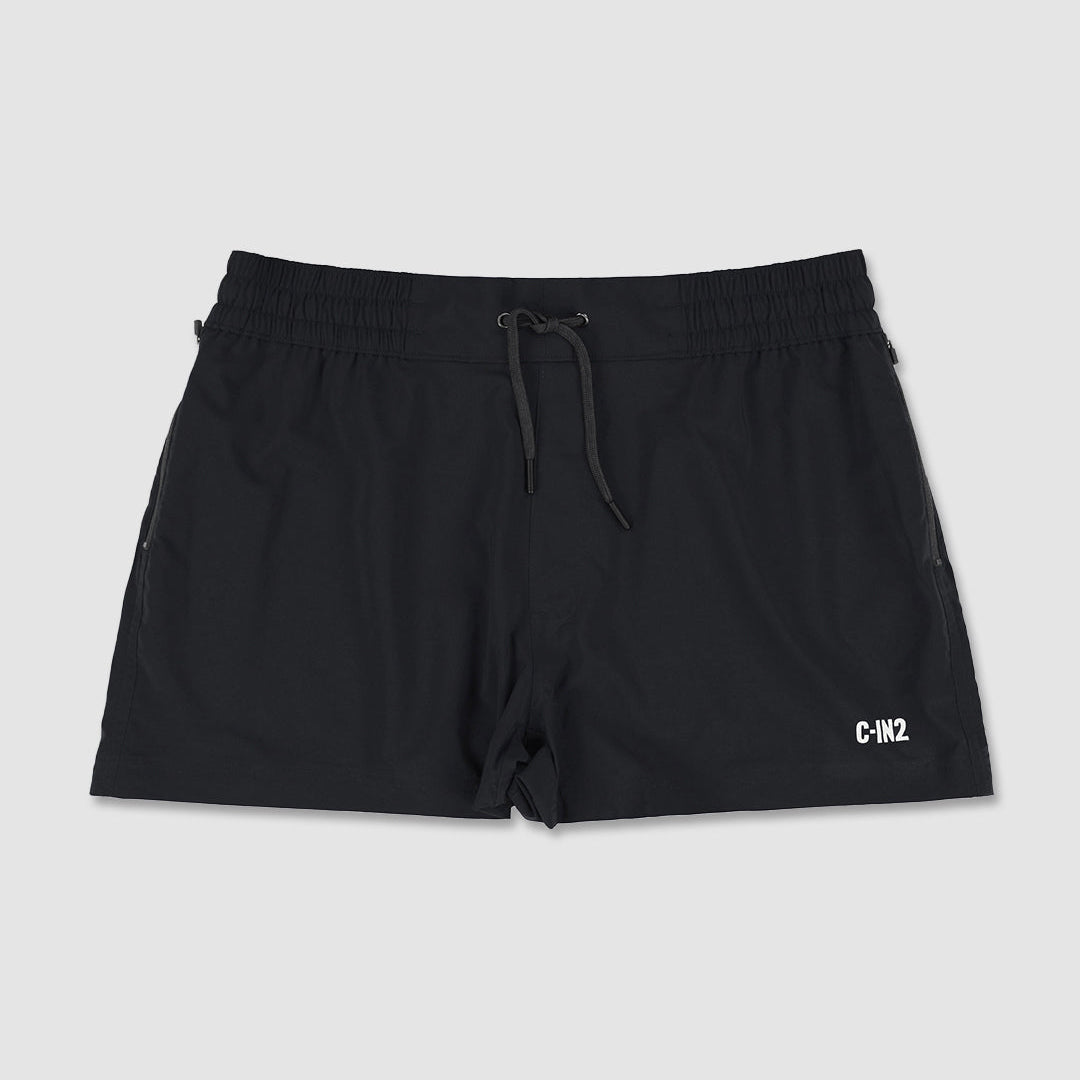 Black swim trunks with a 'C-IN2' brand logo on a light gray background