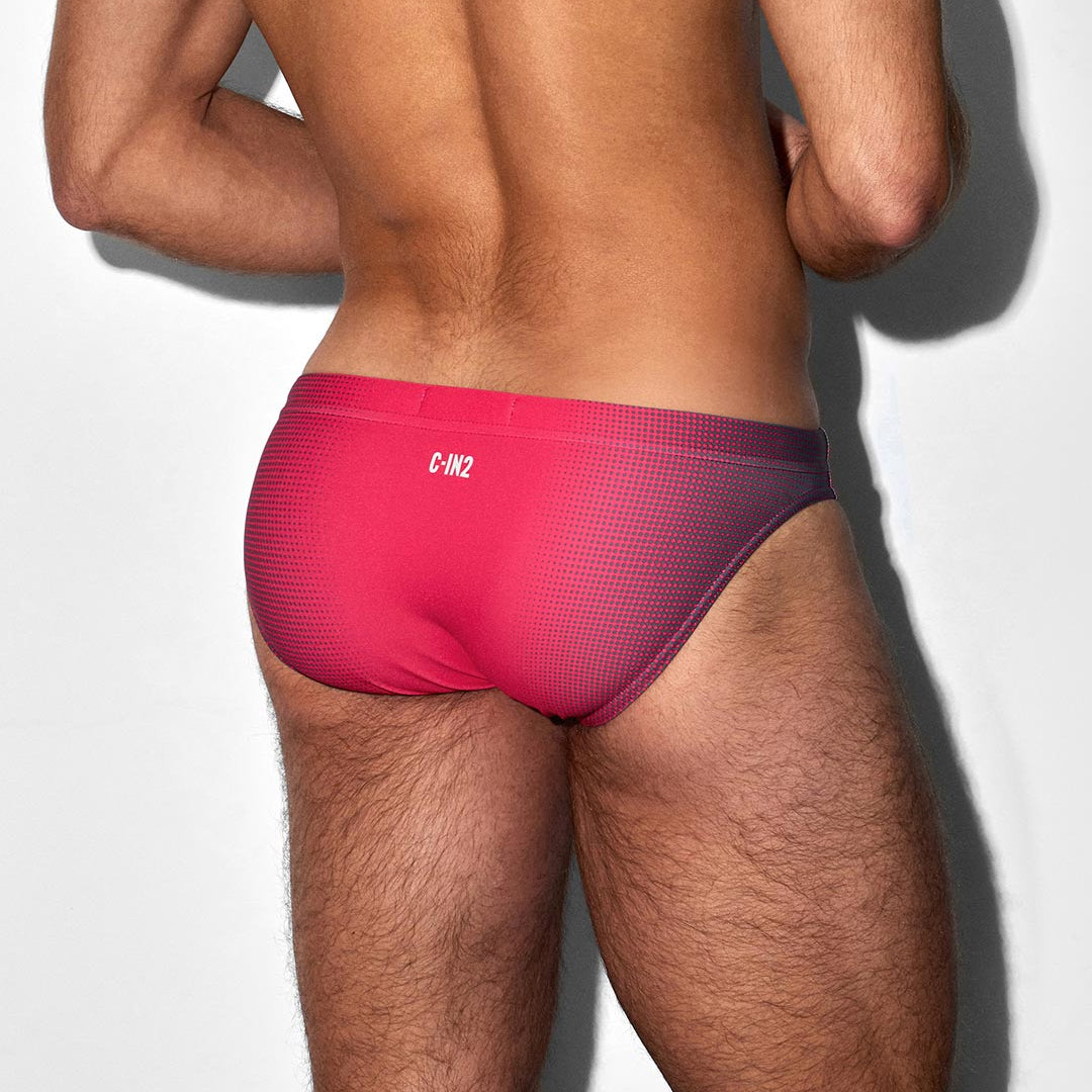 Red men's bikini swim brief with C-IN2 brand logo on a white background