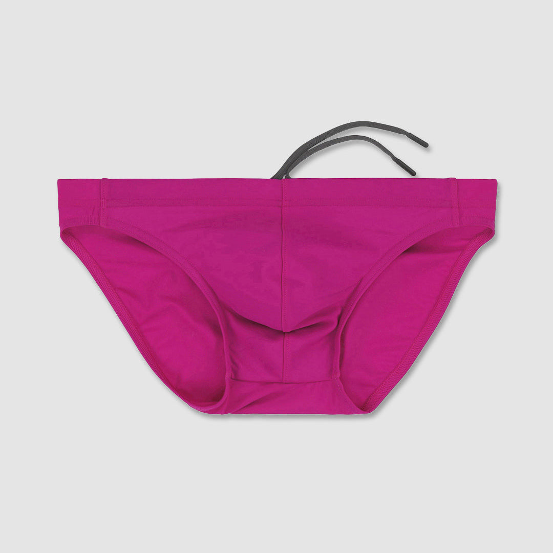 Bright pink bikini bottom with a thin black waist tie, displayed flat against a light gray background.