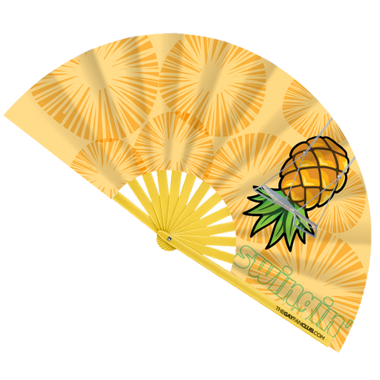 Yellow hand fan with upside-down pineapple design on a white background