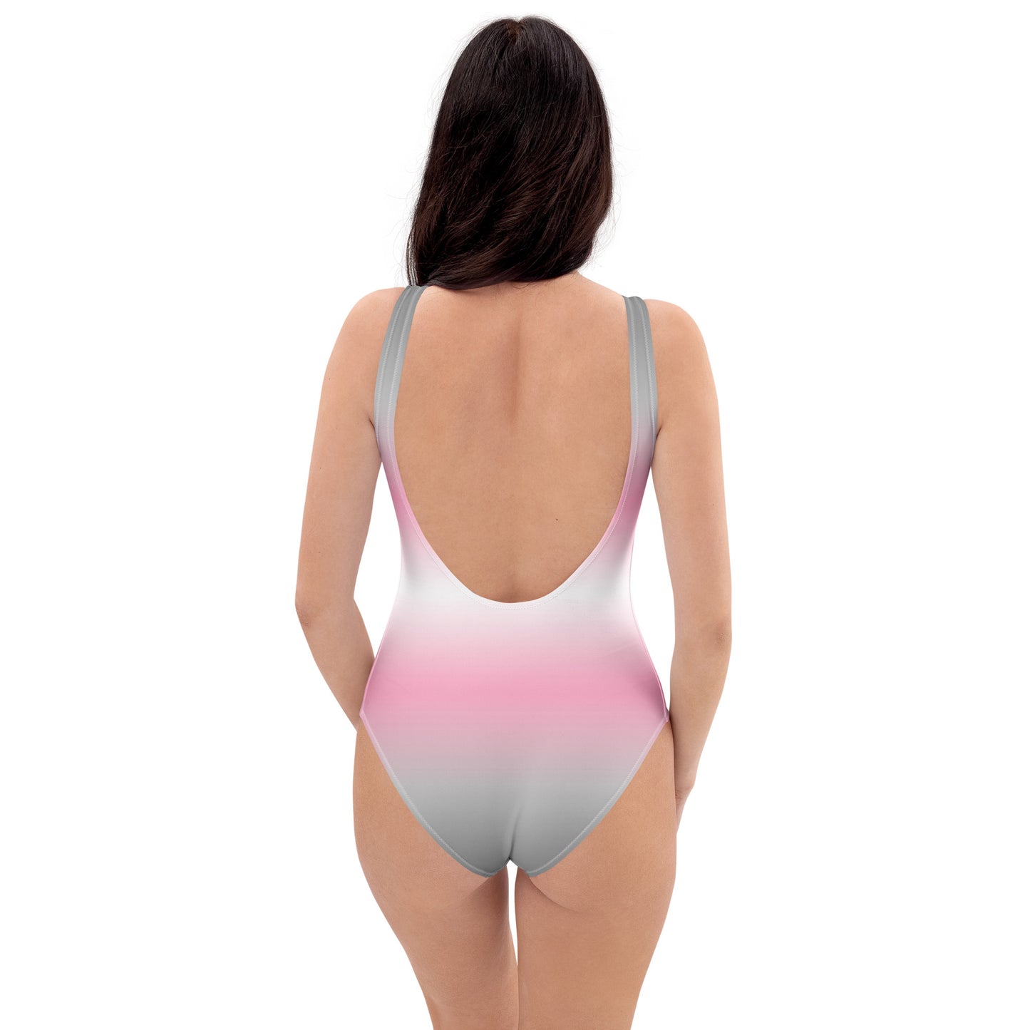 Woman wearing a gradient swimsuit on a white background