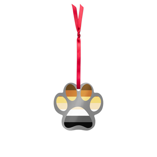 Gay Bear Paw Holiday Metal Ornament hanging from a red ribbon