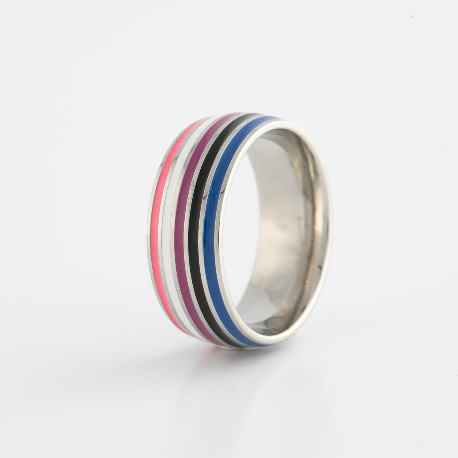 Silver ring with genderfluid pride stripes on a white background