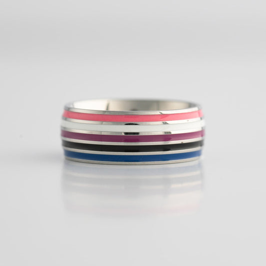 Silver ring with colorful genderfluid pride flag stripes on a light gray background