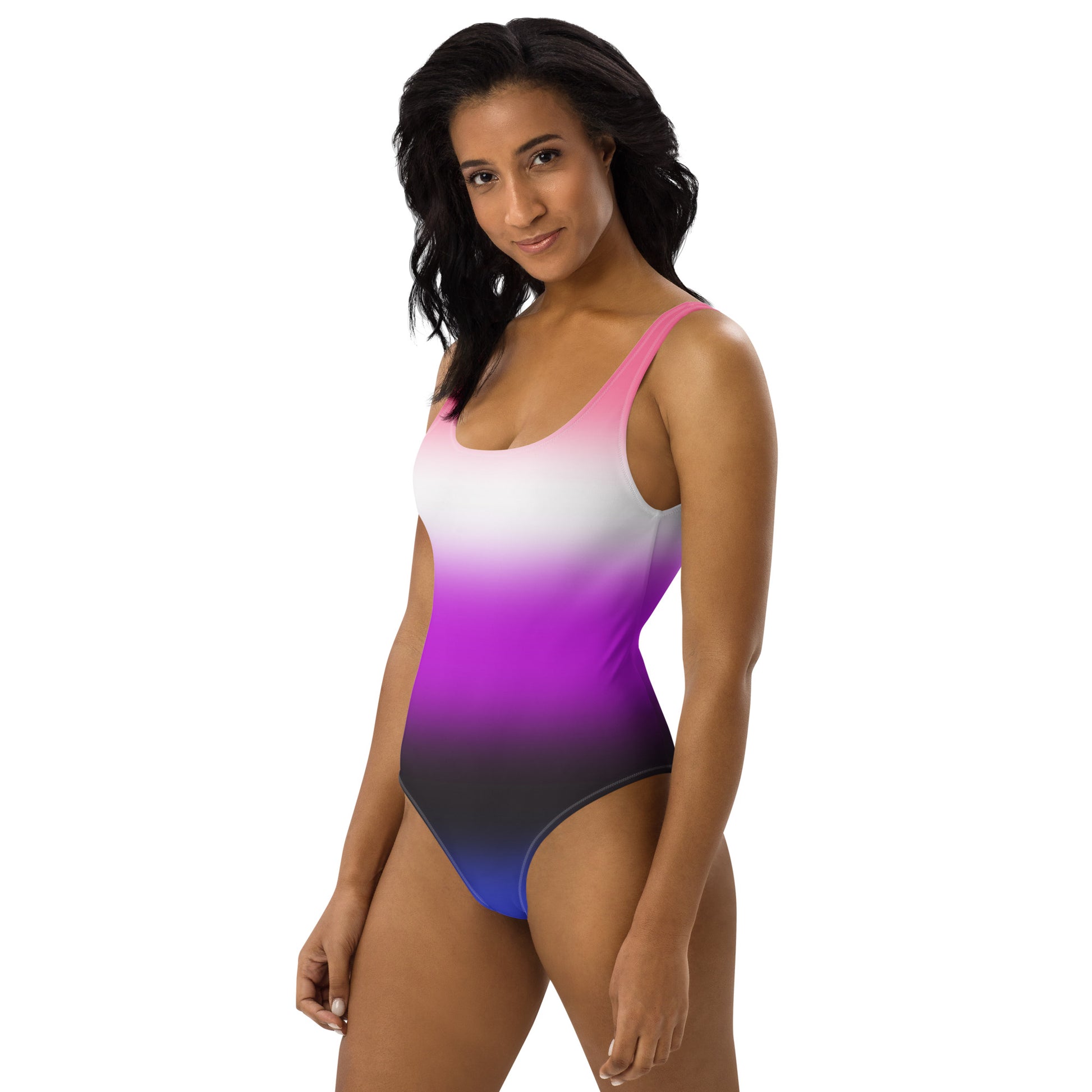 Woman wearing a colorful genderfluid pride gradient swimsuit on a white background