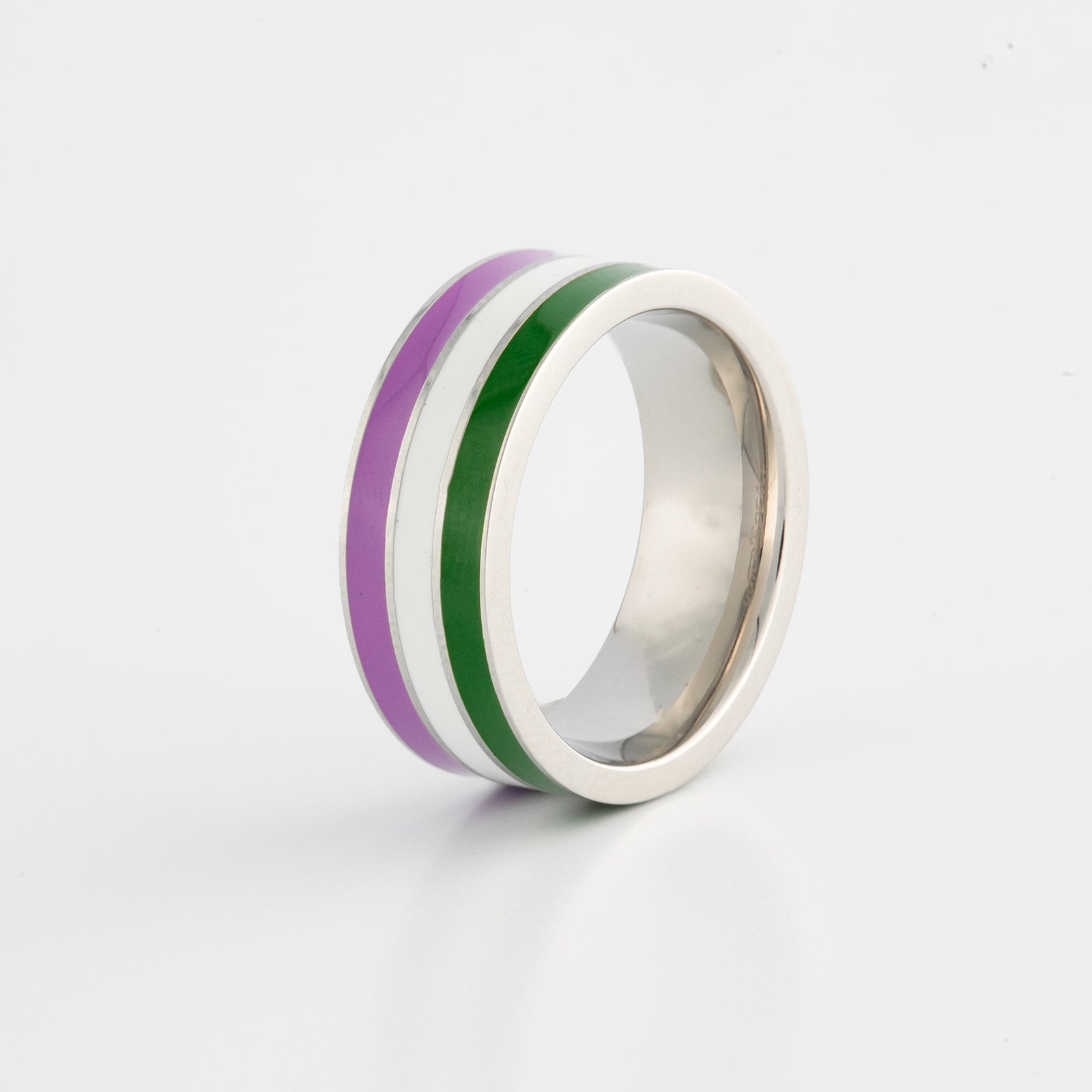 Ring with genderqueer pride stripes on a white background