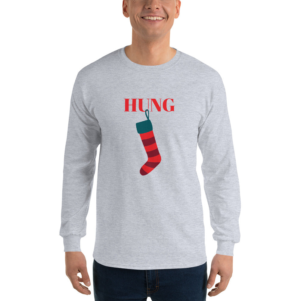person wearing a grey long sleeve shirt with red text that reads 'hung' with a holiday stocking hanging from the letter 'U'